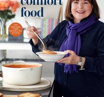 Ina Garten ladles soup into a bowl from a large Dutch oven