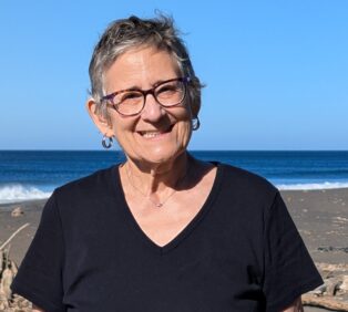Susan Barocas head shot on beach 2026